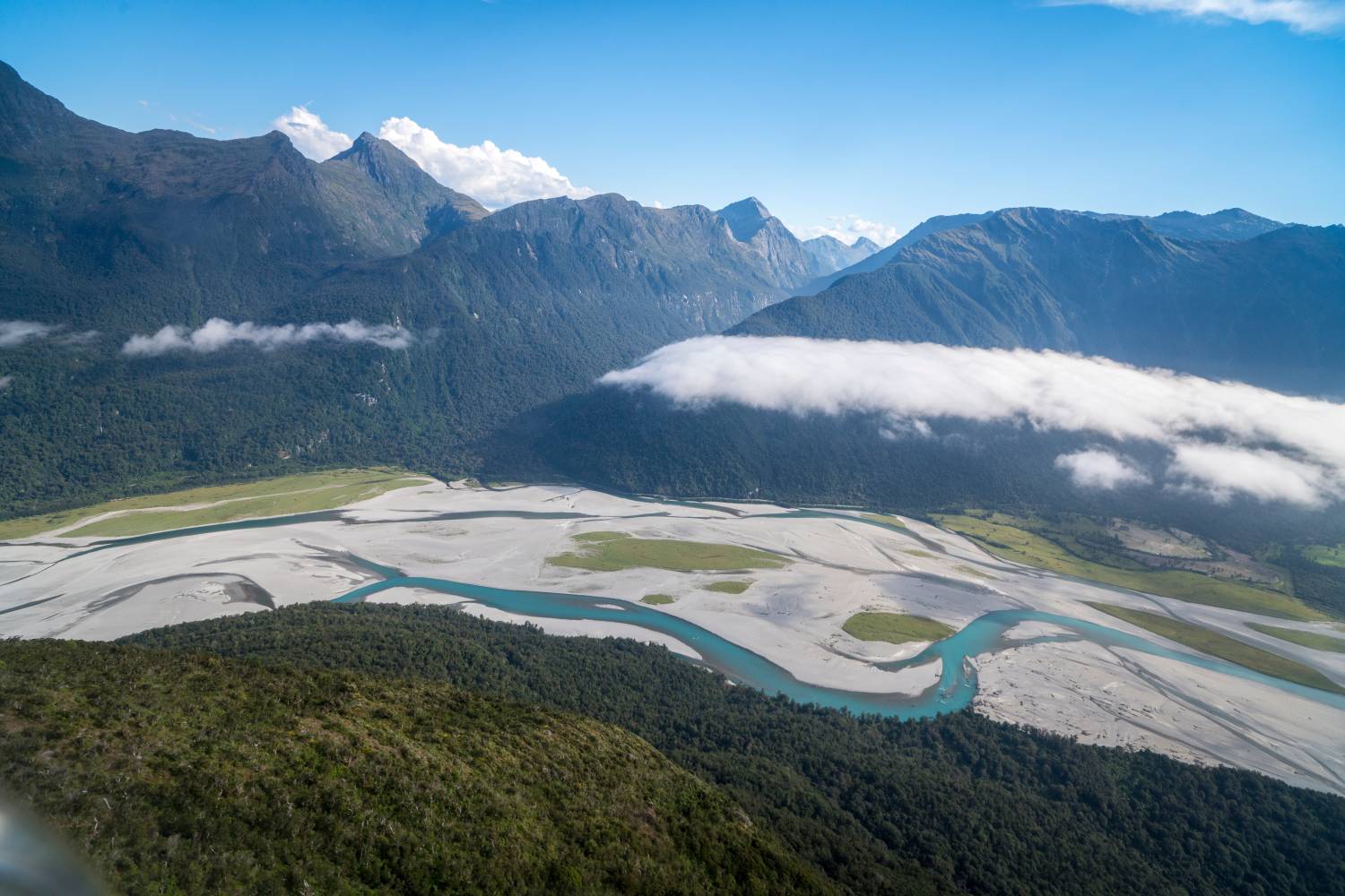 Haast River (Pure Discoveries) Aerial view of braided river flowing through mountains